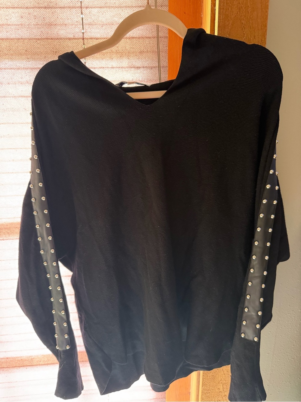 Sioni Black Hooded Top with Silver Stud Sleeve Trim